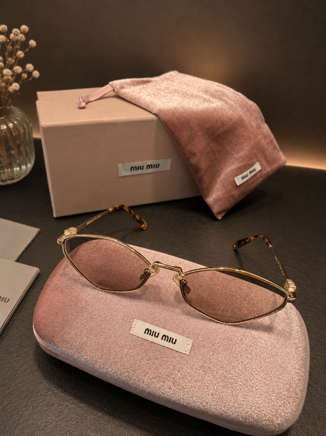 Miu Miu Sonnenbrille in Violett/Gold