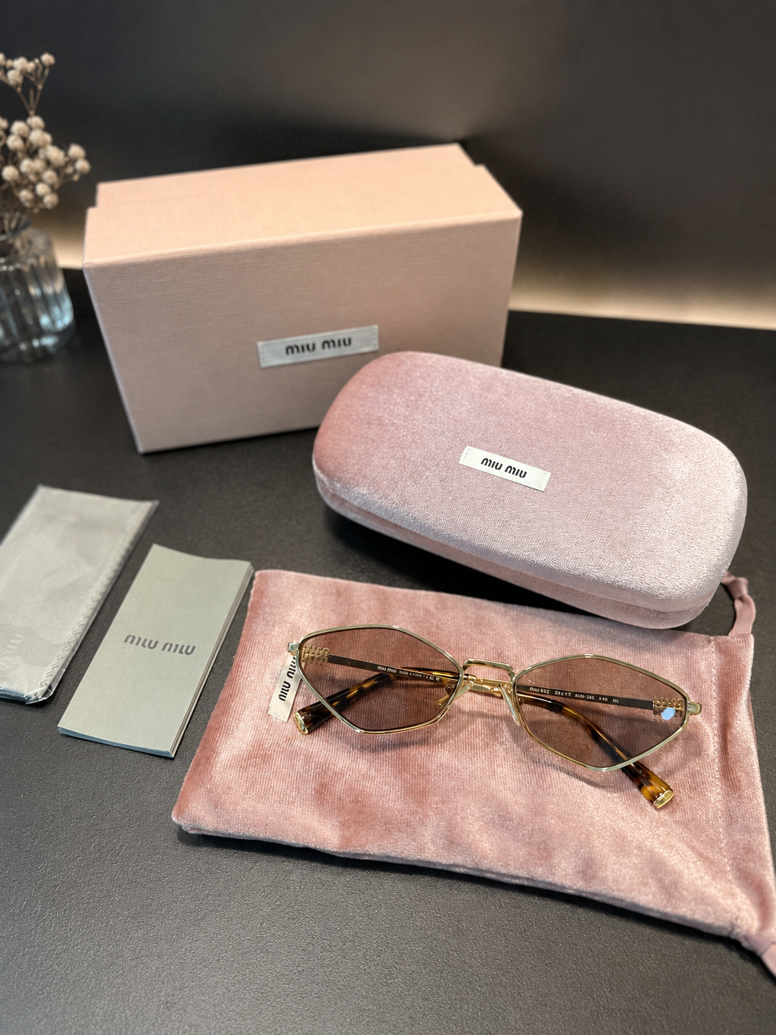 Miu Miu Sonnenbrille in Violett/Gold