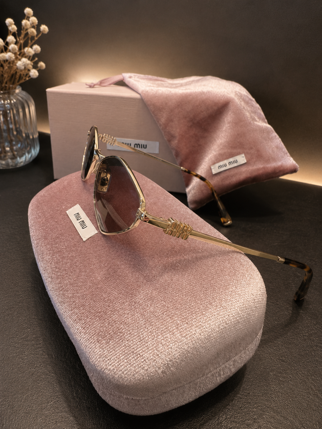 Miu Miu Sonnenbrille in Violett/Gold